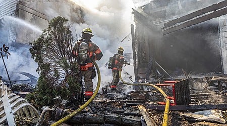 Small plane crashes into Oregon residential building near Portland, engulfing condos in fire, officials say