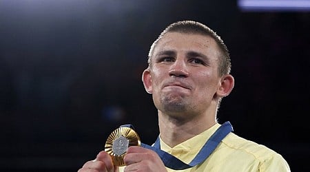 Ukraine's Khyzhniak wins middleweight gold