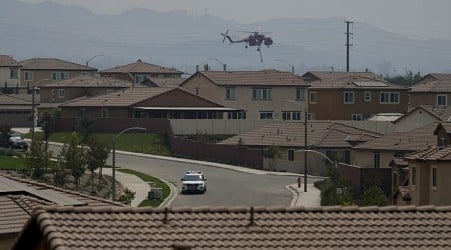 Wildfires east of LA and south of Reno threaten homes and force thousands to evacuate