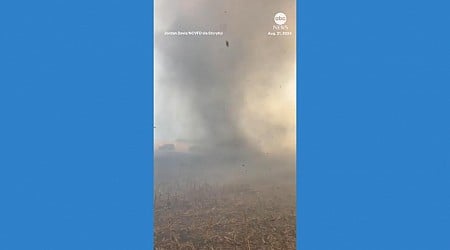 WATCH: Smoke whirls during Alabama cornfield fire