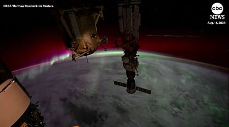 WATCH: A timelapse of the moon setting glowing aurora borealis from ISS