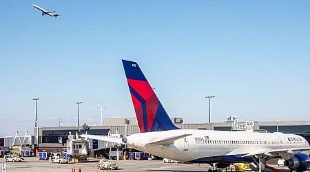 Two Delta planes collide on Atlanta airport taxiway, knocking the tail off one of the jets