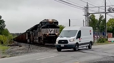 WATCH: Van narrowly misses being hit by oncoming train at crossing