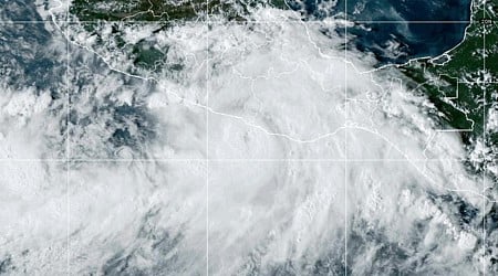 Hurricane John dissipates into a tropical depression