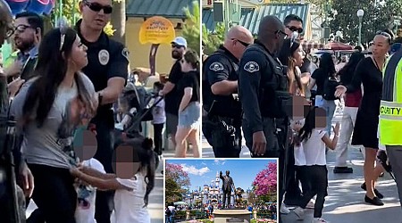 Disneyland mom hauled out in cuffs alongside hysterical children she tried sneaking into park without paying