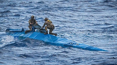 Newly released photos capture British commandos and American forces hunting down a narco-sub carrying $209 million of cocaine in the Caribbean