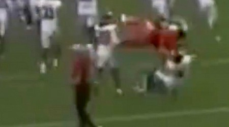 Auburn cheerleader wipes out Oklahoma player with wild backflip