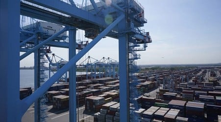 Dockworkers go on a strike that could reignite inflation and cause shortages in the holiday season