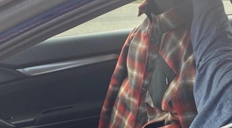 Driver in HOV lane caught using plaid shirt as 'passenger'