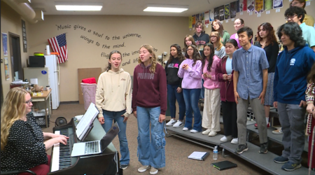 The Vanguard School student choir prepares to perform alongside Foreigner at Ford Amphitheater