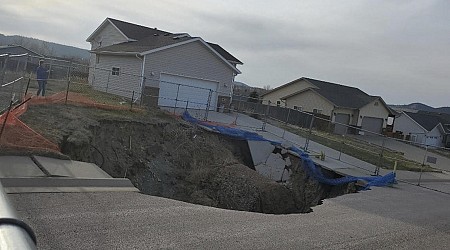 Giant sinkholes in South Dakota neighborhood leave some families stuck