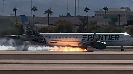 Flames seen under Frontier Airlines flight as it makes hard landing in Las Vegas