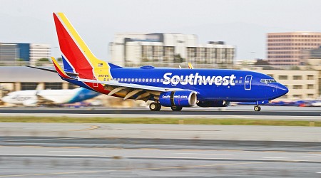 Which 2 Airlines Tie At Operating The Most Flights From Orange County This Month?