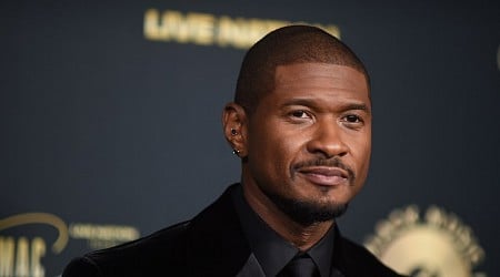 Usher spotted shooting hoops at the State Fair of Texas