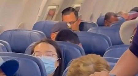 WATCH: Flight attendant has a surprise reunion with her dad on his flight