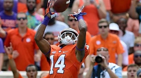 Man arrested in Michigan and charged with slaying of former Clemson receiver in North Carolina