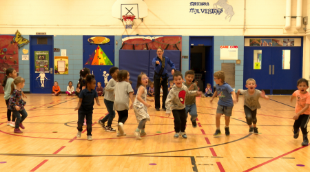 Local elementary school students learn how to protect themselves from a kidnapper