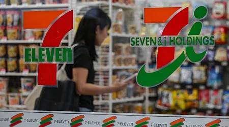 7-Eleven's parent company cuts full-year earnings forecast