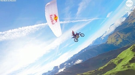 WATCH: Extreme athlete combines motocross with paragliding