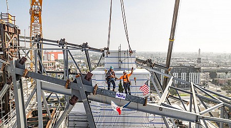 Signed steel beams 'top off' L.A. home for space shuttle Endeavour