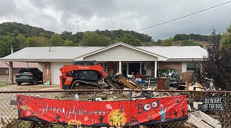 On a Tennessee street hit hard by Helene flooding, strangers show up to help