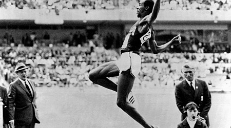 October 18, American shatters long jump world record by nearly two feet