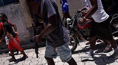 Haiti's gangs luring more children into crime and sexual abuse, HRW says, as 115 people killed in attack