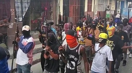 Gang in Haiti massacres 70; leader blames victims as thousands flee