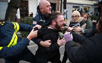 Police in Georgia's capital break up a tent camp set up by protesters demanding a new election