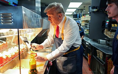 Trump mocks Harris' story from behind the fryer at McDonald's