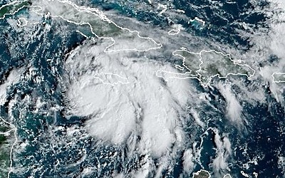 Tropical Storm Rafael slams Caribbean, may head to Gulf Coast this weekend