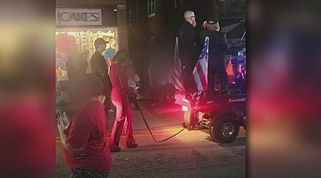 Kamala Harris depicted as chained up behind golf cart during Pennsylvania Halloween parade