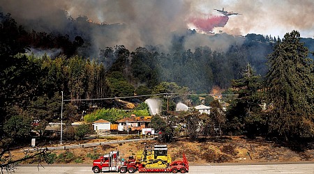 A fast-moving brush fire prompted evacuations in Oakland Hills, California