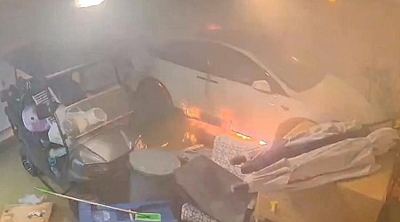 Video captures Tesla vehicle bursting into flames as Hurricane Helene floods Florida garage