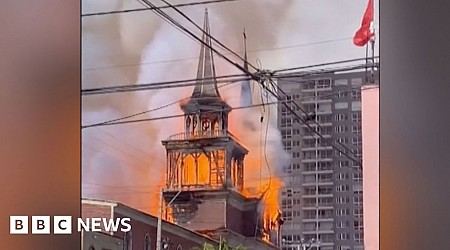 Watch: Tower falls as historic church destroyed by fire