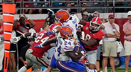 Jacksonville deputies under review after videos of violent fracas with fans at Florida-Georgia football game go viral