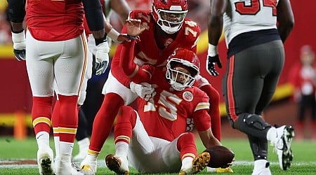 Chiefs' Patrick Mahomes suffers injury scare after TD pass vs. Buccaneers, doesn't miss a snap in overtime win