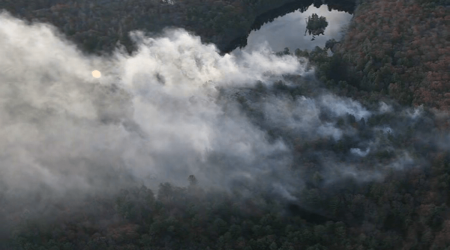 Large brush fire burning near homes, businesses in Saugus