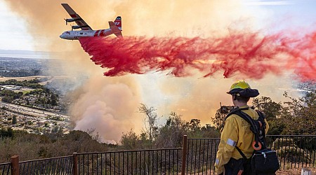 Fast-moving California wildfire destroys dozens of homes, forces thousands to flee