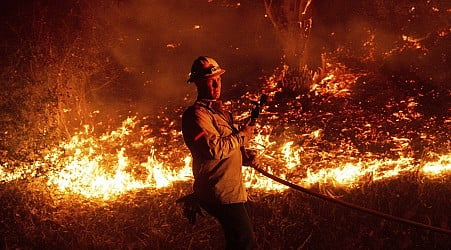 Strong winds fuel rapid spread of wildfires in Southern California