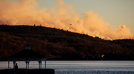 Wildfires on the east and west coasts burn as crews attempt to contain them