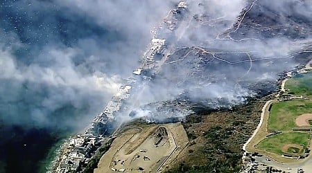 Hundreds flee homes as powerful winds feed wildfires in Southern California