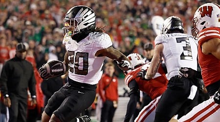 College football grades: Oregon barely passes Wisconsin test with 'C-', Georgia jumps into CFP mix with 'A+'