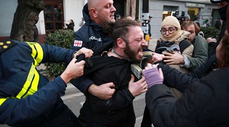 Police in Georgia's capital break up a tent camp set up by protesters demanding a new election