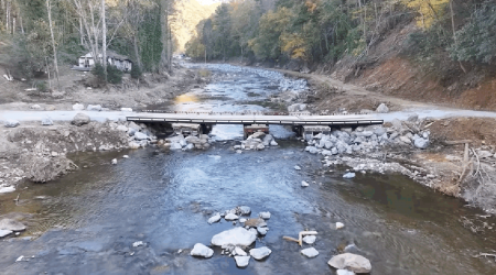 Locals Use Semi Truck Trailers To Replace Bridge Washed Away By Hurricane Helene