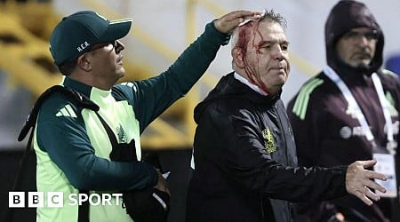 Mexico coach Aguirre hit with beer can after Honduras defeat