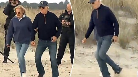 Biden stumbles multiple times, needs assist from Jill as he struggles to walk on sandy Delaware beach