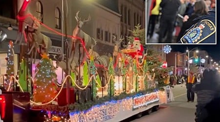 Woman charged with slugging spectator at Santa Claus parade: police