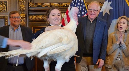 Tim Walz accepts turkey presentation as he eases back into his duties as Minnesota's governor