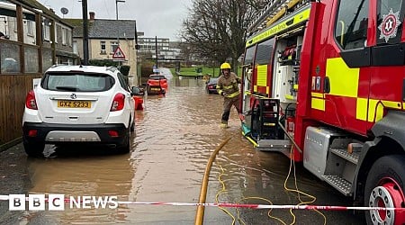 Homes flooded and travel disrupted by Storm Bert